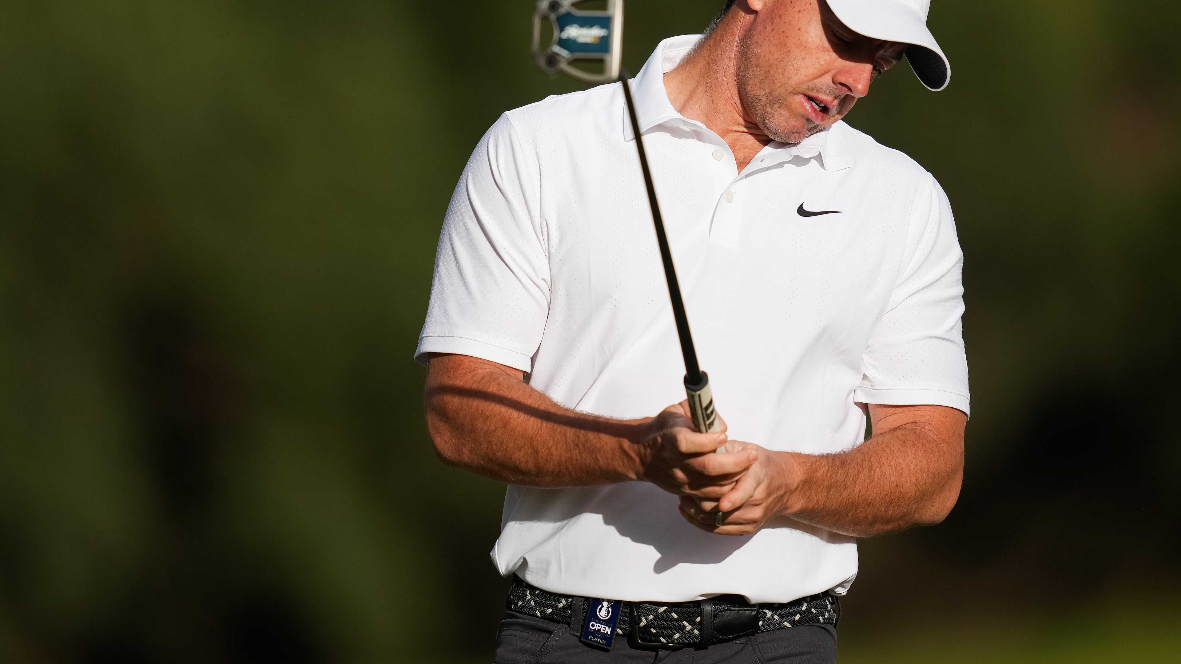 Rory McIlroy. of Northern Ireland, reacts after putting on the the 11th hole during the first round of the Australian Open golf tournament in Melbourne, Australia, Thursday, Dec. 4, 2025. (AP Photo/Asanka Brendon Ratnayake)