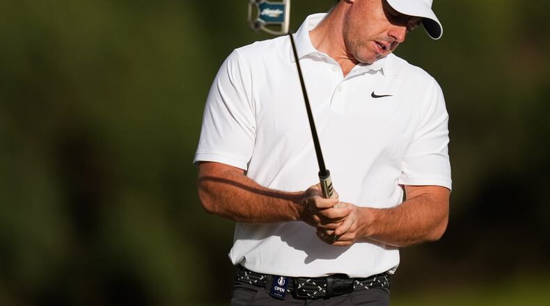 Rory McIlroy. of Northern Ireland, reacts after putting on the the 11th hole during the first round of the Australian Open golf tournament in Melbourne, Australia, Thursday, Dec. 4, 2025. (AP Photo/Asanka Brendon Ratnayake)