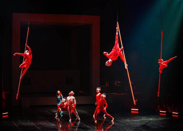 Artists move across the "Echo" stage on poles. Photo: Jean-François Savaria