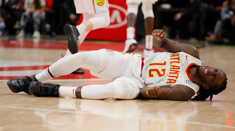 Taurean Prince of the Atlanta Hawks reacts against the Golden State Warriors at State Farm Arena on December 3, 2018 in Atlanta, Georgia.