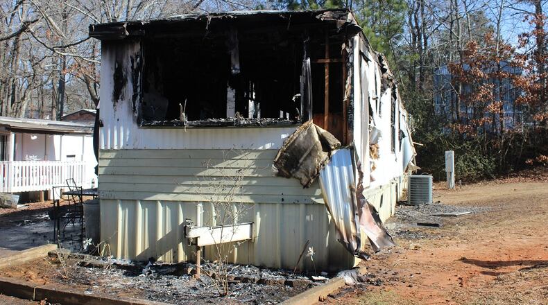 A fire completely destroyed this mobile home, located near Woodstock in Cherokee County.