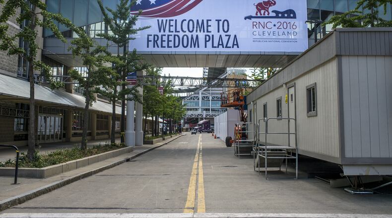 A banner welcoming participants of the 2016 Republican National Convention hangs between Quicken Loans Arena and a parking garage in Cleveland, Ohio. Angelo Merendino/Getty Images