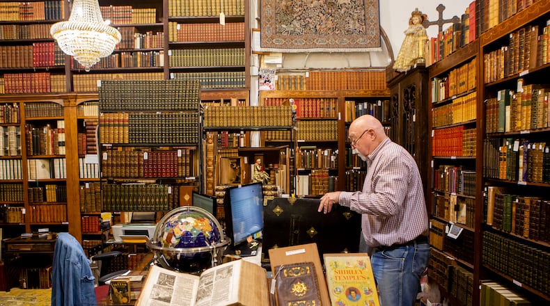 Among the antiquarian books Sonny Ideker sells at City Antiques and Interior Arts in Roswell is an art book signed by Pablo Picasso worth $35,000.  CHRISTINA MATACOTTA FOR THE ATLANTA JOURNAL-CONSTITUTION