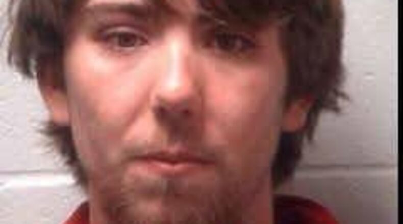 Jacob Hunter Moats, 23, was charged with home invasion, child molestation and aggravated assault. (Credit: Henry County Jail photo)