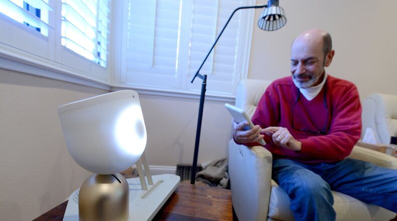 Barry Sardis interacts with ElliQ on Friday, Jan. 26, 2018 in his home in San Jose, Calif. ElliQ, which is currently in beta testing, is a smart speaker that is designed to cater to the elderly and their needs. (Dan Honda/Bay Area News Group/TNS)