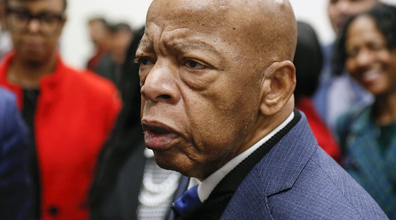 Congressman John Lewis talks with reporters after signing paperwork to qualify for reelection to his District 5 seat in Atlanta on March 2, 2020.