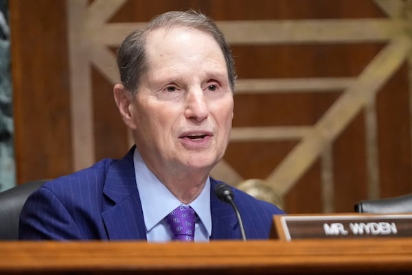 Sen. Ron Wyden, D-Ore., questions U.S. Trade Representative Jamieson Greer as he testifies before the Senate Finance Committee on Capitol Hill in Washington, Tuesday, April 8, 2025. (AP Photo/Mark Schiefelbein)