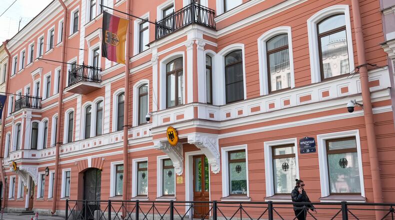 FILE - A woman walks past the German Consulate General building in St. Petersburg, Russia, June 1, 2023. (AP Photo/Dmitri Lovetsky, File)