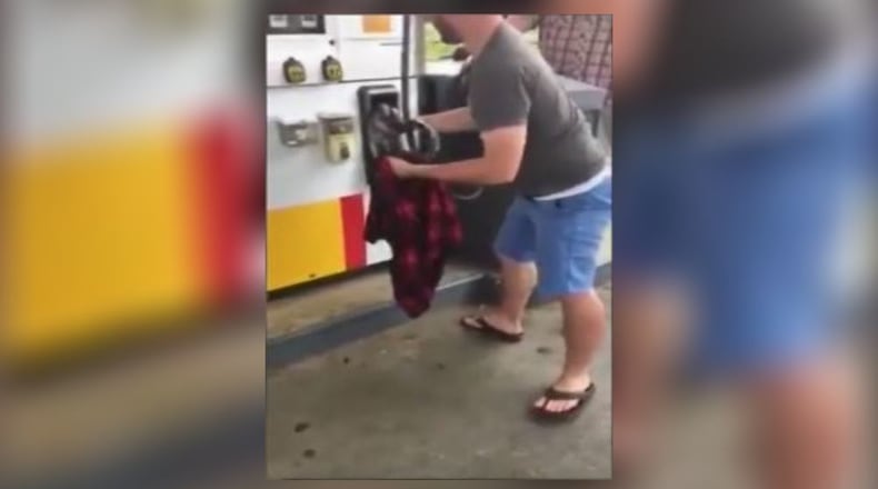 A man pulled a 3-foot snake out of a gas pump in Polk County. (Credit: Channel 2 Action News)