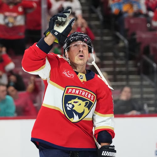 Florida Panthers left wing Brad Marchand celebrates after scoring a goal during the second period of an NHL hockey game against the Dallas Stars, Saturday, Nov. 1, 2025, in Sunrise, Fla. (AP Photo/Lynne Sladky)