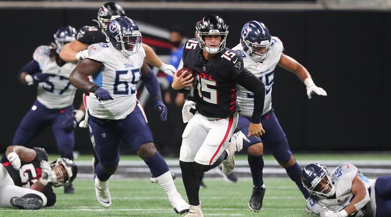Falcons quarterback Feleipe Franks breaks loose for a long first down run against the Tennessee Titans during the fourth quarter Friday, Aug. 13, 2021, in Atlanta. (Curtis Compton / Curtis.Compton@ajc.com)