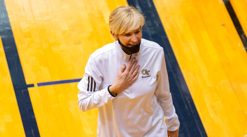 Georgia Tech coach Nell Fortner smiles after the team's 73-56 win over West Virginia in a college basketball game in the second round of the NCAA women's tournament, at the UTSA Convocation Center in San Antonio on Tuesday, March 23, 2021. (AP Photo/Stephen Spillman)