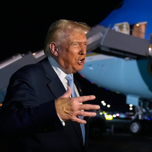 President Donald Trump speaks to reporters before boarding Air Force One at Palm Beach International Airport in West Palm Beach Fla., on his way back to the White House, Sunday, Nov. 16, 2025. (AP Photo/Manuel Balce Ceneta)