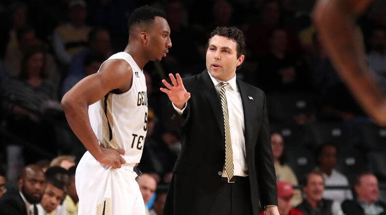 Georgia Tech coach Josh Pastner talks with guard Josh Okogie during their game against Clemson.