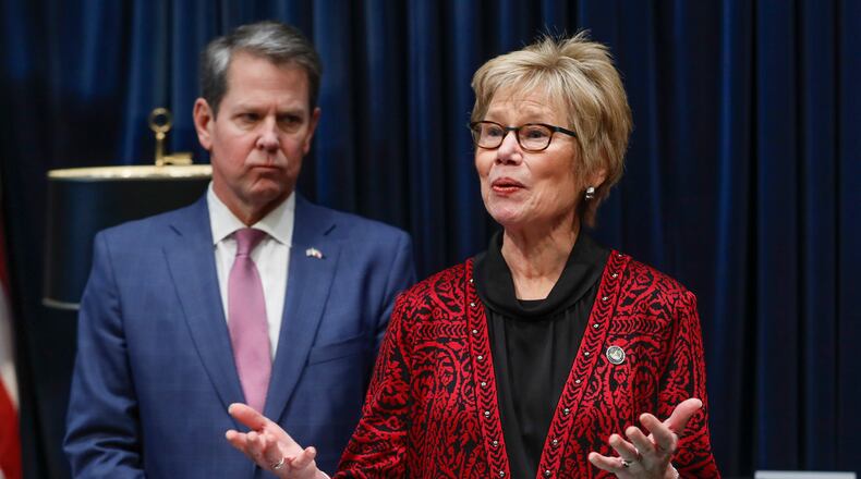 Gov. Brian Kemp and Georgia Public Health Commissioner Kathleen Toomey speak during a media briefing on Feb. 28, 2020. Bob Andres / robert.andres@ajc.com