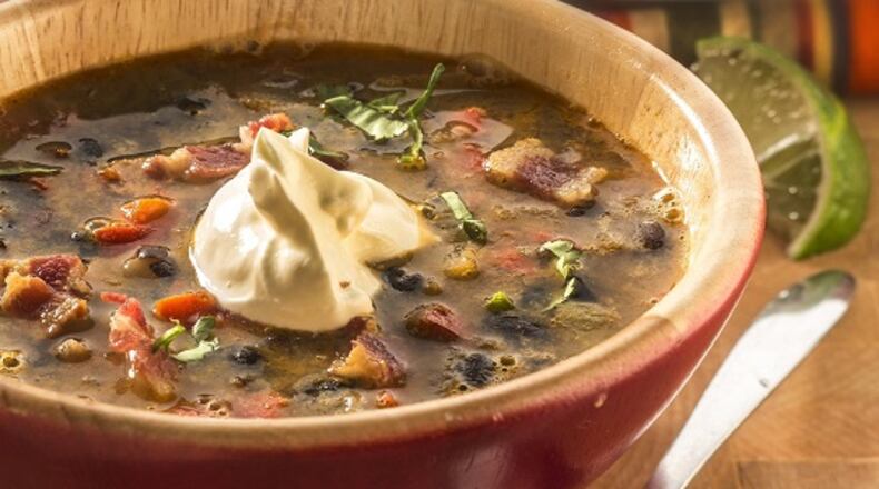 Make a can of black beans into something altogether different with bacon, sauteed red bell peppers and onions, and a hit of oregano. (Bill Hogan/Chicago Tribune/TNS)