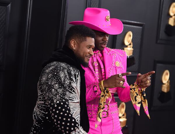 Usher, left, and Lil Nas X represented Atlanta at the 62nd annual Grammy Awards at the Staples Center on Sunday, Jan. 26, 2020, in Los Angeles. (Photo by Jordan Strauss/Invision/AP)