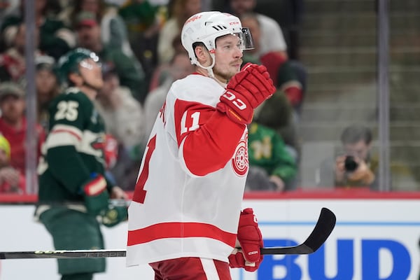 FILE - Detroit Red Wings right wing Vladimir Tarasenko (11) celebrates after scoring a goal during the second period of an NHL hockey game against the Minnesota Wild,, Feb. 25, 2025, in St. Paul, Minn. (AP Photo/Abbie Parr, file)