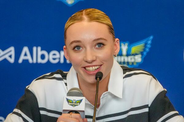 Dallas Wings' Paige Bueckers, selected No. 1 overall in the WNBA basketball draft, speaks during an introductory press conference Wednesday, April 23, 2025, in Dallas. (AP Photo/Julio Cortez)