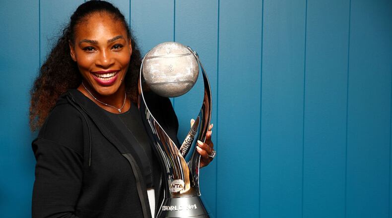 MELBOURNE, AUSTRALIA - JANUARY 28: Serena Williams of the United States poses with the WTA world No.1 trophy after winning the Women's Singles Final against Venus Williams of the United States on day 13 of the 2017 Australian Open at Melbourne Park on January 28, 2017 in Melbourne, Australia.  (Photo by Clive Brunskill/Getty Images)
