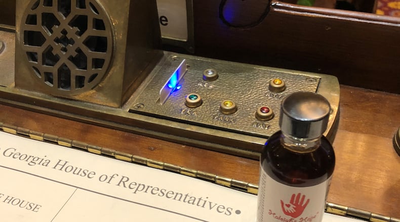 A vial of cannabis oil sat on Allen Peake's desk on Thursday night, as his legislative career came to a close. Photo courtesy of Allen Peake