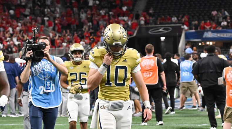 Georgia Tech's quarterback Haynes King (10) leaves the football field after Louisville defeat Georgia Tech during the inaugural Aflac Kickoff Game at Mercedes-Benz Stadium, Friday, September 1, 2023, in Atlanta. Louisville won 39-34 over Georgia Tech. (Hyosub Shin / Hyosub.Shin@ajc.com)