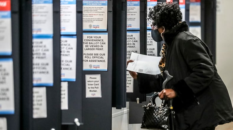November 30, 2021 Atlanta: Sylvia Cook-Lopez votes at Antioch Baptist Church North located at 540 Cameron M. Alexander Blvd, NW in Atlanta on Tuesday, Nov. 30, 2021. The runoff election that will set the course for the next four years at Atlanta City Hall will be decided Tuesday, as voters went to the polls to elect the city's 61st mayor. Tuesday caps off a historic election cycle that saw the incumbent mayor forego a re-election bid and a former mayor seek a third term at City Hall. The race ends with two City Council colleagues on the ballot for mayor: Councilman Andre Dickens and City Council President Felicia Moore, who both have big plans to bolster the ranks of the police department, improve basic city services and reopen City Hall to the public. (John Spink / John.Spink@ajc.com)