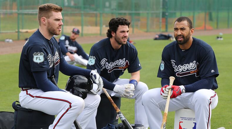 The Braves’ (from left) Freddie Freeman, Dansby Swanson and Matt Kemp fared differently in FanGraph’s positional power rankings. (Curtis Compton/ccompton@ajc.com)