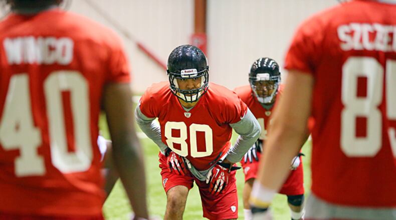 050513 FLOWERY BRANCH: Falcons rookie tight end Levine Toilolo (80), Stanford, runs drills during rookie minicamp on Sunday, May 5, 2013, in Flowery Branch. CURTIS COMPTON / CCOMPTON@AJC.COM