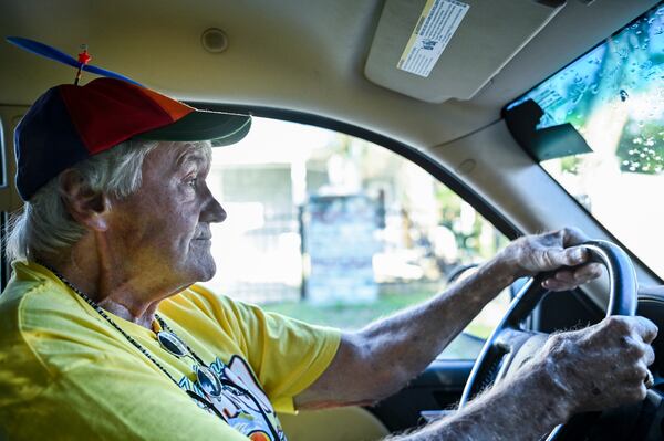 Beach Bum Parade founder Jack Boylston leads the start of the festivities on May 15. (Sarah Peacock for the AJC)