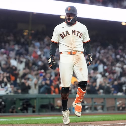 San Francisco Giants' Heliot Ramos reacts after hitting a three-run home during the sixth inning of a baseball game against the Toronto Blue Jays Monday, July 6, 2026, in San Francisco. (AP Photo/Jeff Chiu)