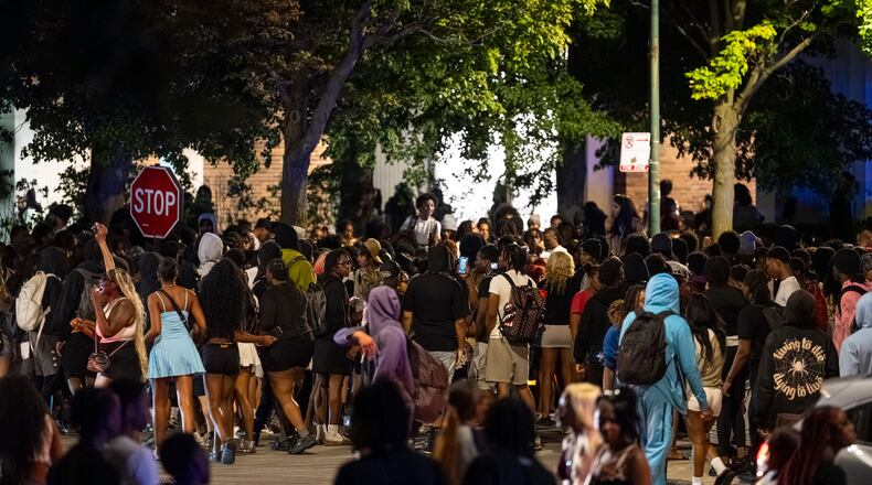 Hundreds of young people gather near the Griffin Museum of Science and Industry in the Hyde Park neighborhood as Chicago police officers attempt to disperse them, Monday, May 25, 2026. (Tyler Pasciak LaRiviere/Chicago Sun-Times via AP, File)
