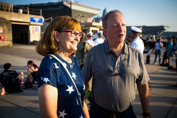 Cindy and Andrew Forrest came to send off their son, surface warfare officer Andrew Forrest, 28, on the USS Gerald R. Ford as the aircraft carrier prepares to leave for deployment from Naval Station Norfolk, Tuesday, June 24, 2025, in Norfolk, Va. (AP Photo/John Clark)