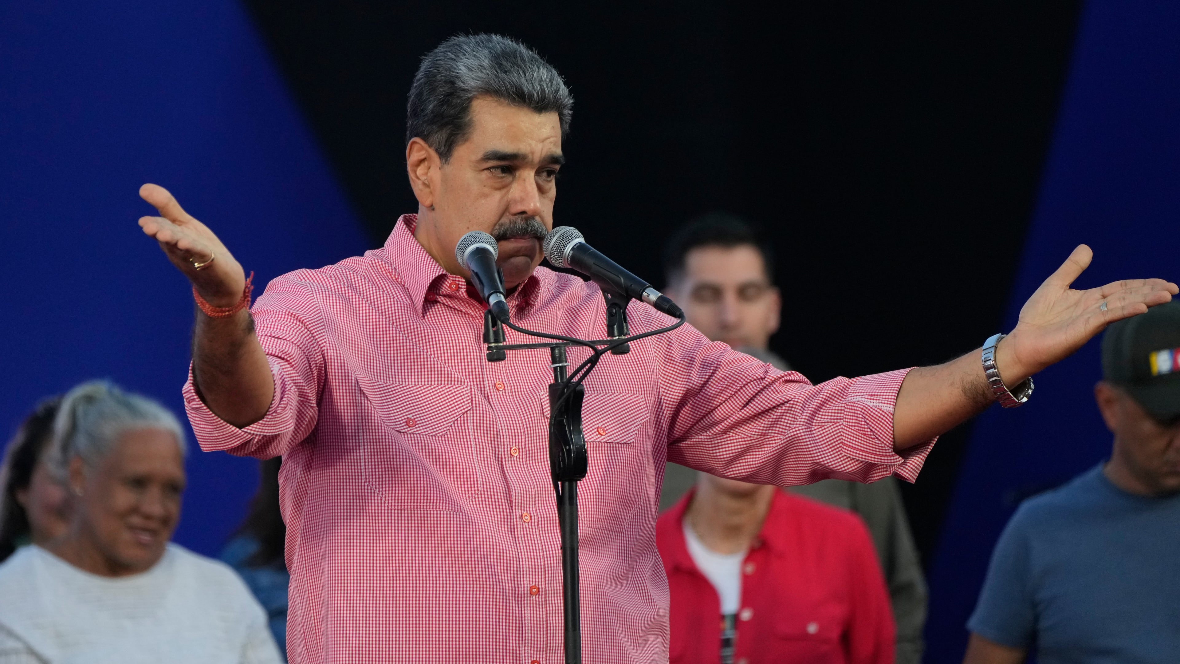 Venezuelan President Nicolas Maduro speaks during a state-led civic-military event in the Petare neighborhood of Caracas, Venezuela, Saturday, Nov. 15, 2025. (AP Photo/Ariana Cubillos)