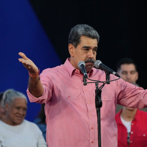 Venezuelan President Nicolas Maduro speaks during a state-led civic-military event in the Petare neighborhood of Caracas, Venezuela, Saturday, Nov. 15, 2025. (AP Photo/Ariana Cubillos)
