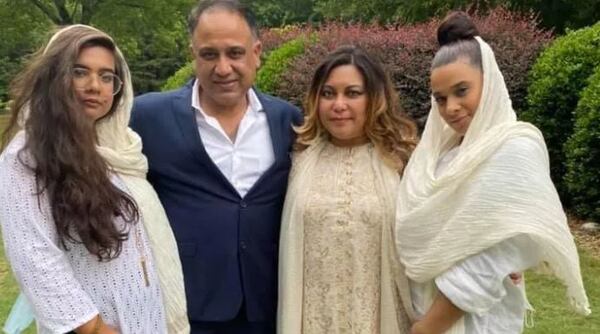 Catherine Khan (right) died after she fell from a Lamborghini in the intersection of Piedmont and Peachtree roads. She is shown with other members of her family.