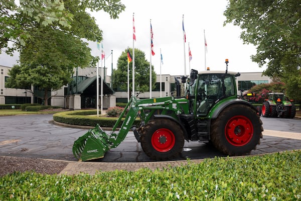 Tractors are shown at the AGCO Corporate Headquarters, Monday, August, 11, 2025, in Duluth, Ga. The Fortune 500 company whose headquarters is in Duluth, recently celebrated its 35 year anniversary. (Jason Getz/AJC)
