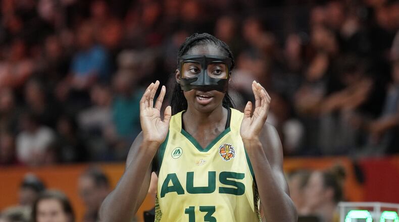 Australia's Ezi Magbegor reacts during the Women's Basketball World Cup match between Australia and Puerto Rico in Berlin, Friday, Sept. 4, 2026. (AP Photo/Ebrahim Noroozi)