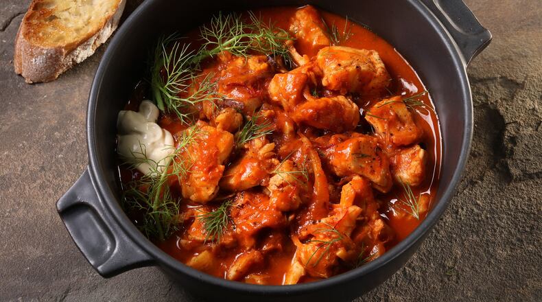 Fish stew is flavored with fennel, tomatoes, leeks saffron and a big dollop of homemade aioli, stirred in at the end. (Abel Uribe/Chicago Tribune/TNS)