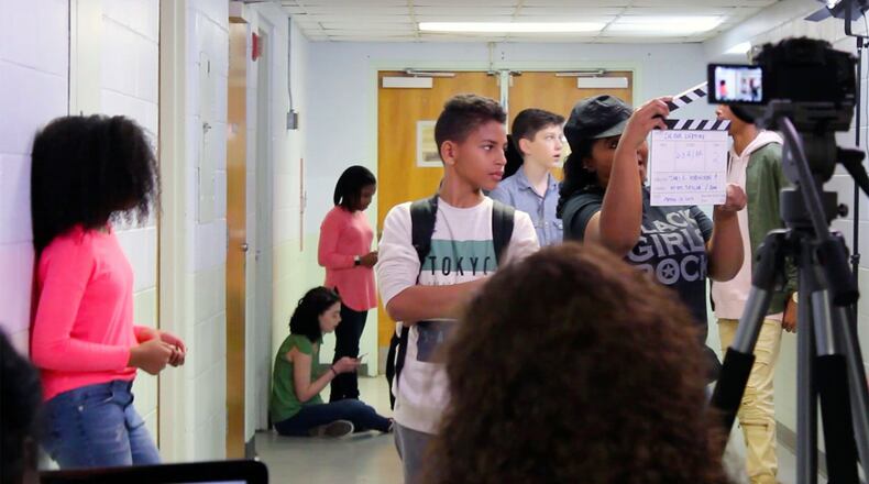 Joseph Matthews (center) plays the role of self-proclaimed nerd Cody Morgan in the Atlanta teen soap opera “In Our Lifetime.” CONTRIBUTED BY T&T MANAGEMENT AND PRODUCTION