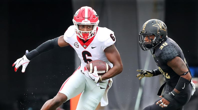 Georgia wide receiver Javon Wims makes a reception against Vanderbilt during the first half in a NCAA college football game on Saturday, October 7, 2017, in Nashville.   Curtis Compton/ccompton@ajc.com