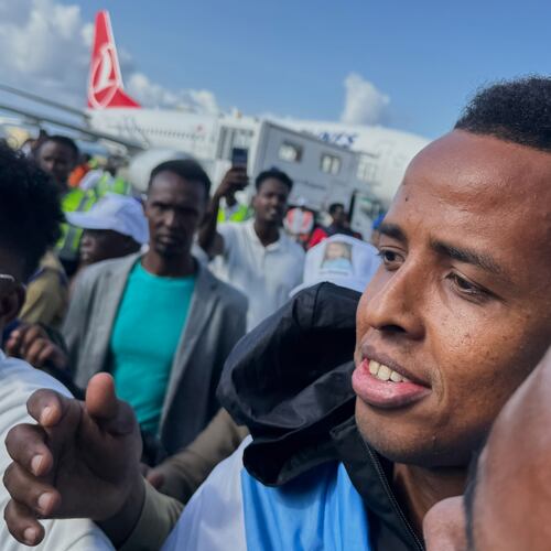 Referee Omar Artan, who was denied entry to the United States, is welcomed by supporters upon his arrival in Mogadishu, Somalia, Wednesday, June 10, 2026. (AP Photo/Farah Abdi Warsameh)