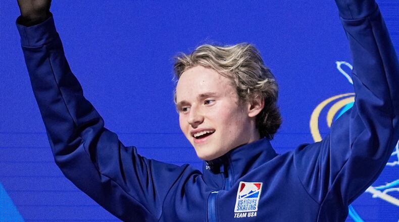 FILE - Ilia Malinin, of the United States, reacts after performing during the men's free skating program at the figure skating world championships, March 29, 2025, in Boston. (AP Photo/Charles Krupa)