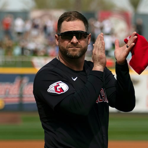 FILE - Cleveland Guardians manager Stephen Vogt turns to acknowledge veterans before the start of a spring training baseball game against the Cincinnati Reds, Feb. 24, 2024, in Goodyear, Ariz. (AP Photo/Carolyn Kaster, File)