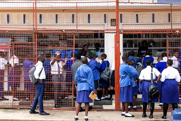 Students shop at the school canteen during lunch break at Uganda Martyrs' Secondary School Namugongo, in Kampala, Uganda Monday, May 26, 2025. (AP Photo/Hajarah Nalwadda)