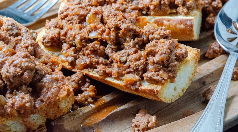 Beef Ragu Crostone on toasted baguette is an Italian-inspired simple supper. (Virginia Willis for The Atlanta Journal-Constitution)