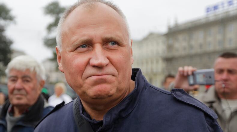 FILE - Veteran activist Mikalai Statkevich attends a protest in Minsk, Belarus, Sept. 8, 2017. (AP Photo, File)