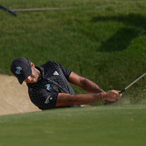 Aaron Rai of England hits a shot from a bunker on the 7th hole during the third round of the Abu Dhabi Golf Championship in Abu Dhabi, United Arab Emirates, Saturday, Nov. 8, 2025. (AP Photo/Altaf Qadri)