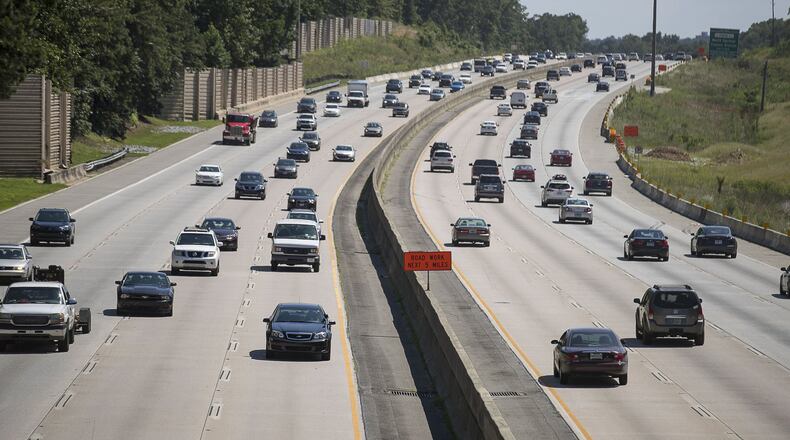 Automobiles travel along Georgia 400, Wednesday, July 24, 2019. Cities along Ga. 400 petitioned the Georgia Department of Transporation to have a say in how the new highway is being designed as part of the ongoing project. (Alyssa Pointer/alyssa.pointer@ajc.com)