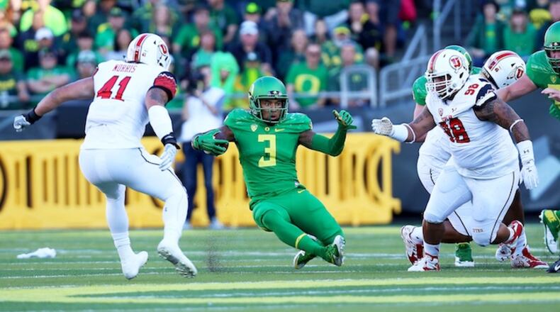 Oregon quarterback Vernon Adams Jr. (3) slides during the first half of an NCAA college football game against Utah, Saturday, Sept. 26, 2015, in Eugene, Ore. (AP Photo/Ryan Kang)